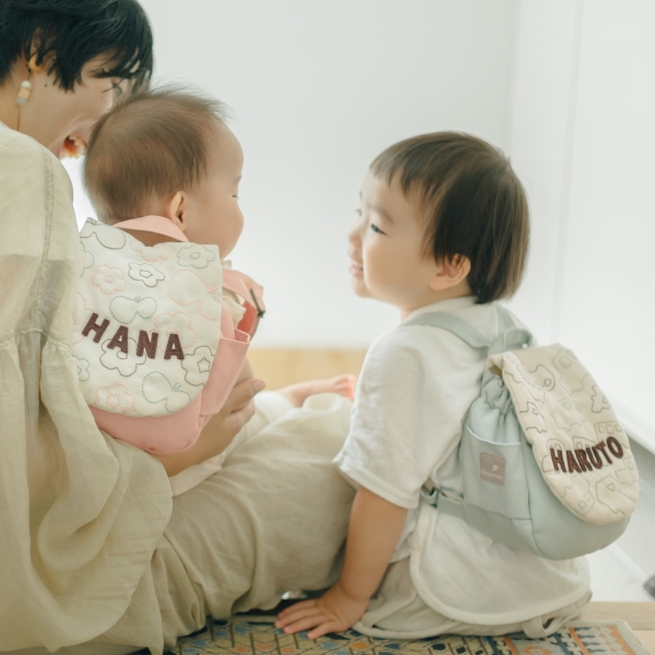 名入れドーナツスタイの2枚セット｜出産祝いに喜ばれるおしゃれなよだれかけ